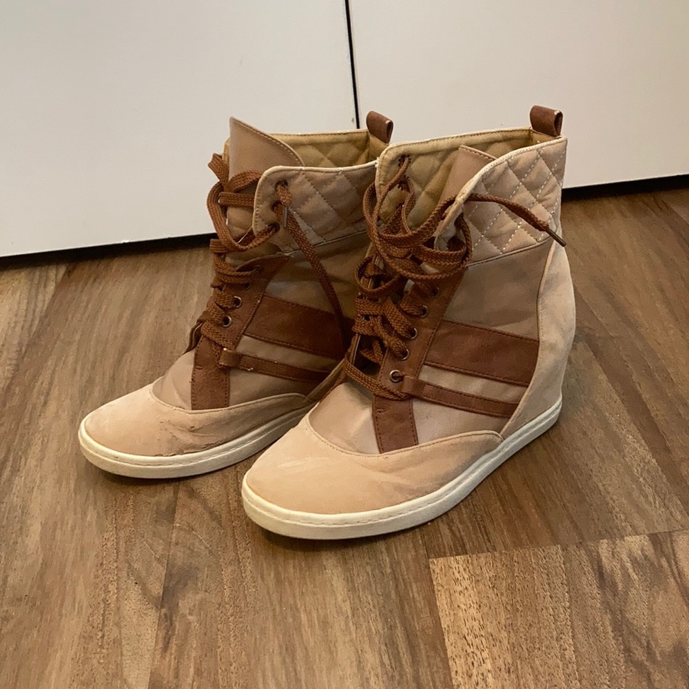 Tan boots with heels inside
